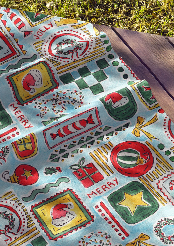 Christmas fabric design with Santa Hats, trees, bows and stars in frames using pastel colours. Australian Surface Pattern Design by Queensland Artist Laura Hamzic