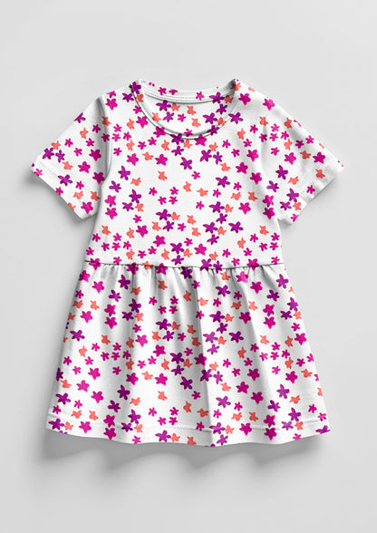 Ditsy Daisy - Little Girls Dress featuring Floral pattern design by Laura Hamzic Australian Surface Pattern Designer - Pink and Orange on White