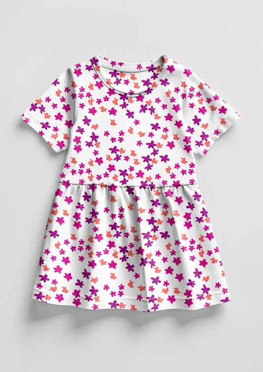 Ditsy Daisy - Little Girls Dress featuring Floral pattern design by Laura Hamzic Australian Surface Pattern Designer - Pink and Orange on White