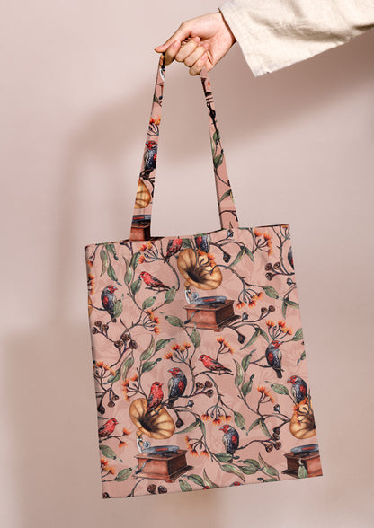 Phhopping bag featuring Laura Hamzic's Finch Falsetto pattern, eucalyptus blossoms and finches growing from gramophones.