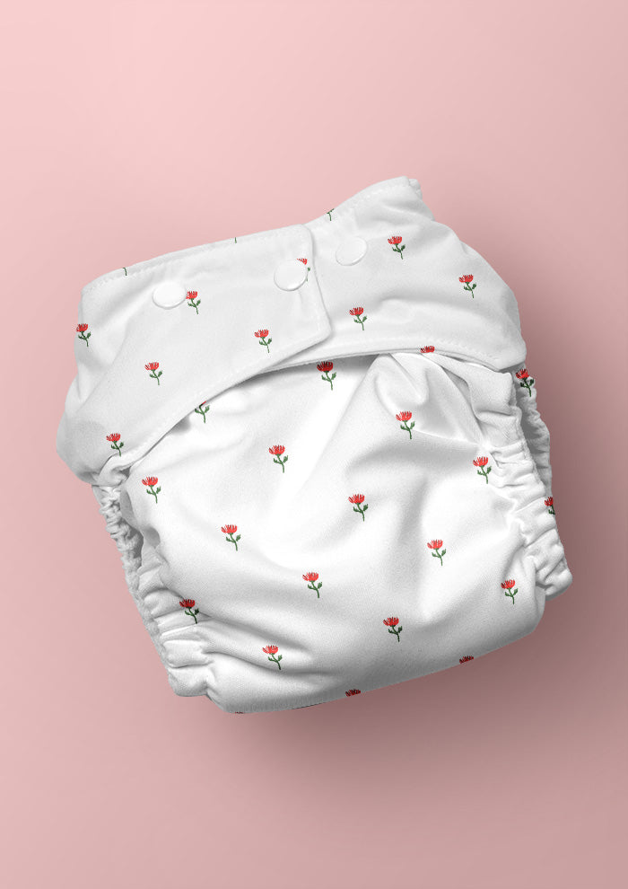 Floral Polka textile design hand-painted by Brisbane watercolour pattern designer Laura Hamzic. Available for licensing
