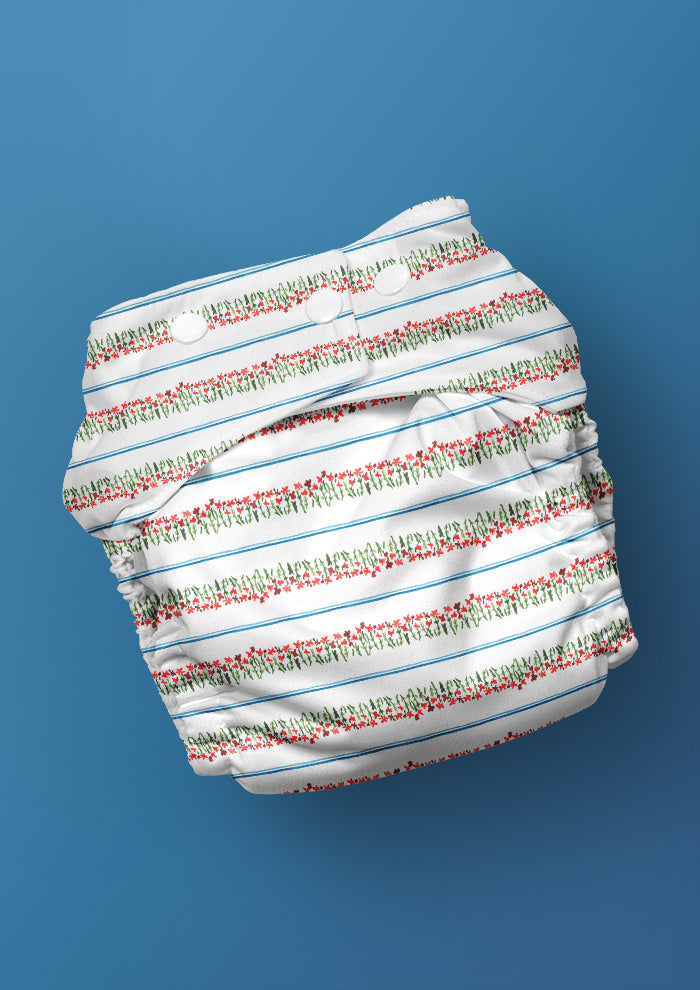 A delicate watercolour pattern for baby nappies featuring little flowers and stripes artwork by Laura Hamzic Brisbane Surface Pattern Designer