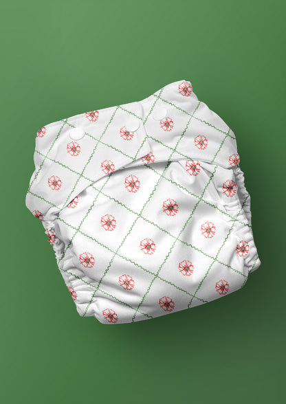 A delicate watercolour pattern for baby nappies featuring flowers in a diamond check by Laura Hamzic Brisbane Surface Pattern Designer