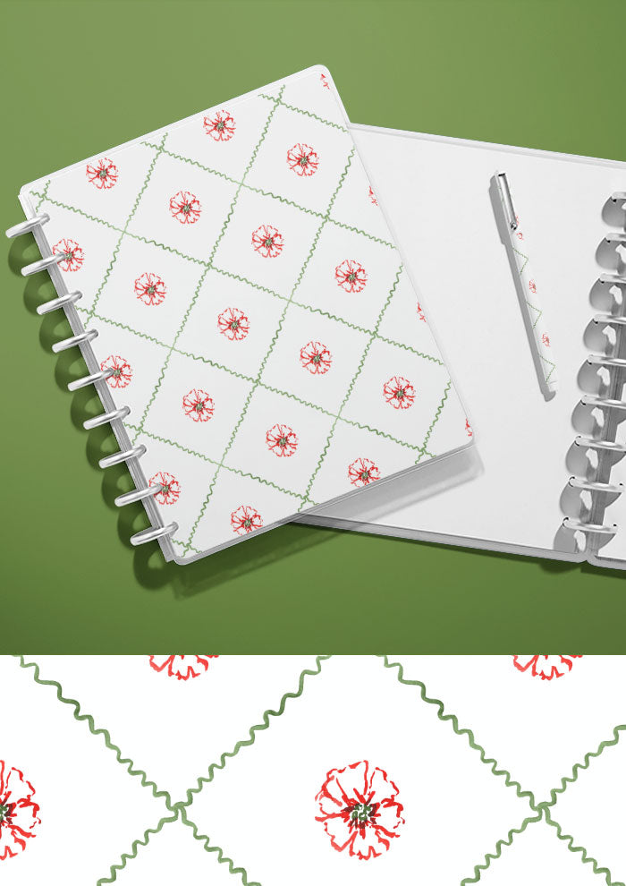 A journal with a watercolour pattern on the cover featuring flowers in a diamond check artwork by Laura Hamzic Brisbane Surface Pattern Designer