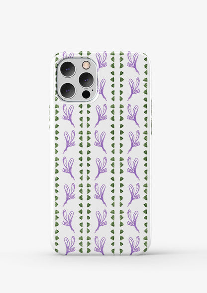 Phone case mockup displaying the Jacaranda Path pattern by Laura Hamzic, Australian surface pattern designer