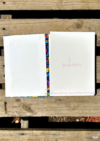 Open Paisley Days journal showing Fabriano 200gsm watercolour pages