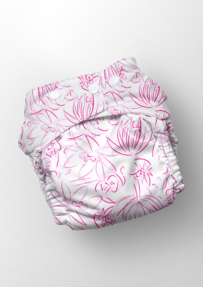 White diaper nappy with pink floral pattern on a white background