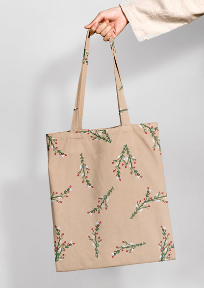 Tote bag mockup showcasing the Mock Orange Berries (Beige) pattern by Laura Hamzic, Australian surface pattern designer