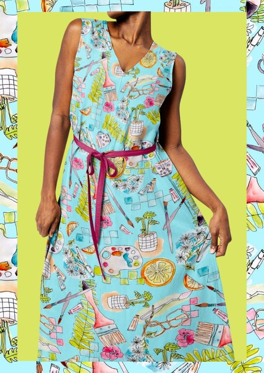 Women’s dress featuring the Painter’s Playground pattern with playful hand-painted artist studio illustrations