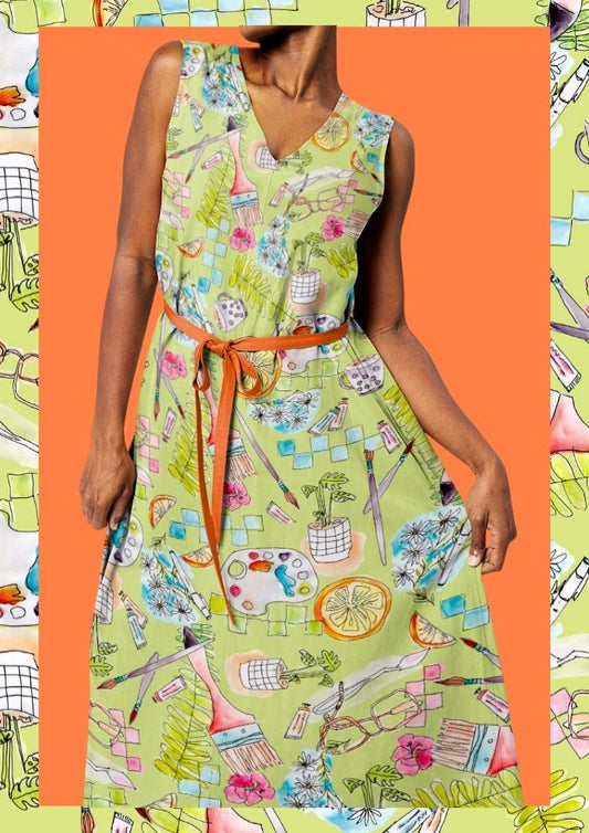 Women’s dress featuring the Painter’s Playground pattern with playful hand-painted artist studio illustrations