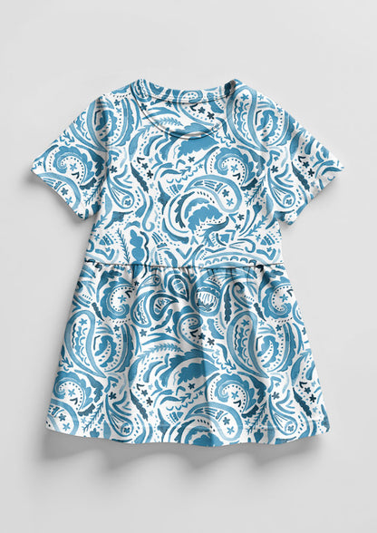 Denim Paisley Blues pattern on little girl's dress mockup. Pattern design by Laura Hamzic, Australian Artist.