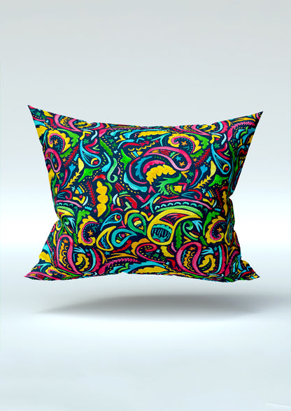 Rainbow Paisley Days pattern on navy, cushion mockup. Pattern design by Laura Hamzic, Australian Artist.