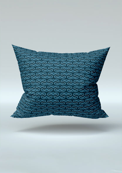 Denim Paisley Whirl pattern on navy, cushion mockup. Pattern design by Laura Hamzic, Australian Artist.