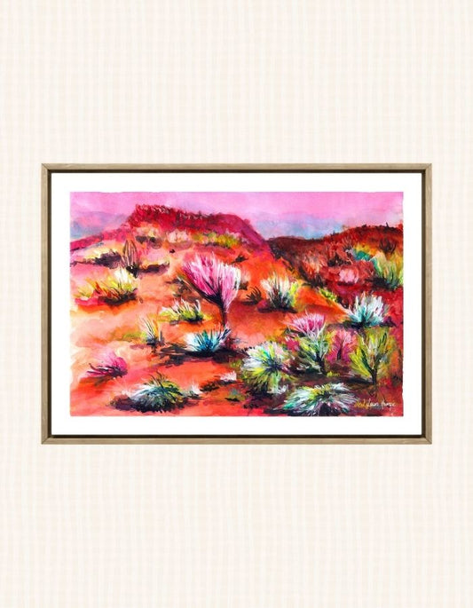 Watercolour art print of the vibrant desert scrub of regional Australia captured in bright whimsical colours and red desert hues, hand-painted by Laura Hamzic.