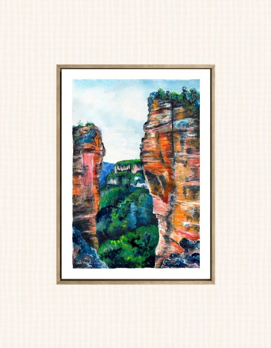 Watercolour art prints of Halls Gap, Blue Mountains, New South Wales, Australia - capturing the detail of the red craggy rock formations against the stunning blue green mountains - painted by Laura Hamzic