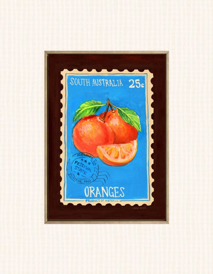 A framed vintage-style South Australia orange illustration print, featuring two oranges and an orange slice on a bright blue background with white text reading 'SOUTH AUSTRALIA 25¢' and 'ORANGES'.