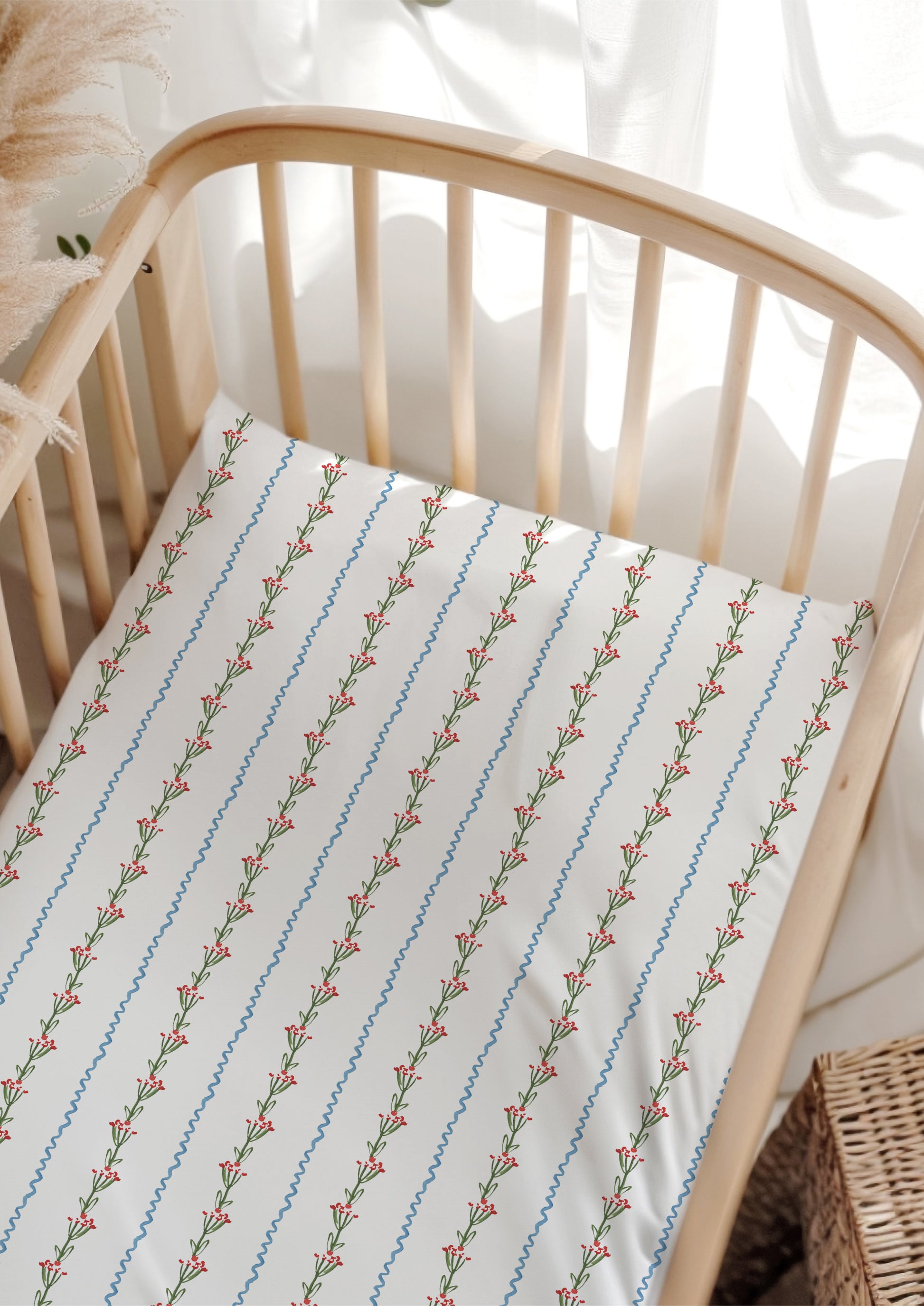 A delicate watercolour pattern for baby cot sheets featuring little flowers and ribbons artwork by Laura Hamzic Brisbane Surface Pattern Designer