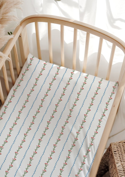 A delicate watercolour pattern for baby cot sheets featuring little flowers and ribbons artwork by Laura Hamzic Brisbane Surface Pattern Designer