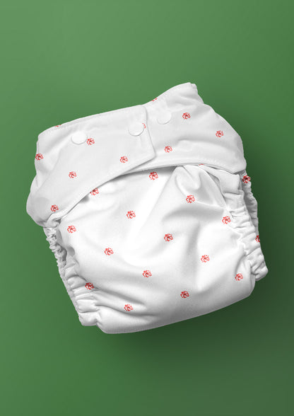 Tiny Blooms textile design on nappy, hand-painted by Brisbane watercolour pattern designer Laura Hamzic. Available for licensing