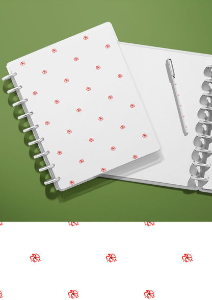 Tiny Blooms textile design on notebook, hand-painted by Brisbane watercolour pattern designer Laura Hamzic. Available for licensing