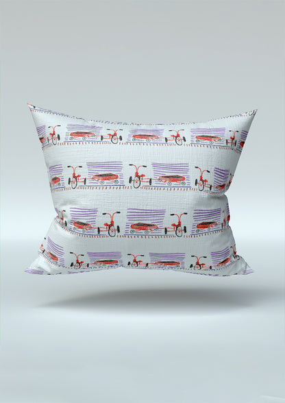Cushion mockup featuring the Trike Tracks pattern by Laura Hamzic, Australian surface pattern designer