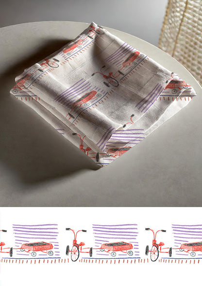 Tea towel mockup showcasing the Trike Tracks pattern by Laura Hamzic, Australian surface pattern designer