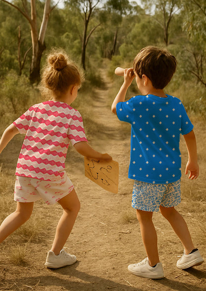 Children’s clothing featuring Zig Zag Track, Star Bright, Spinifex Scatter, Etched Earth patterns – bold coloured pencil surface design inspired by bushwalks and outback adventures, Australian kidswear fabric.