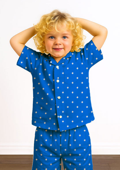 Kids pyjamas with Star Bright playful pencil star pattern – inspired by camping trip night skies, Australian children’s fabric, whimsical kidswear, surface pattern design for sleepwear.